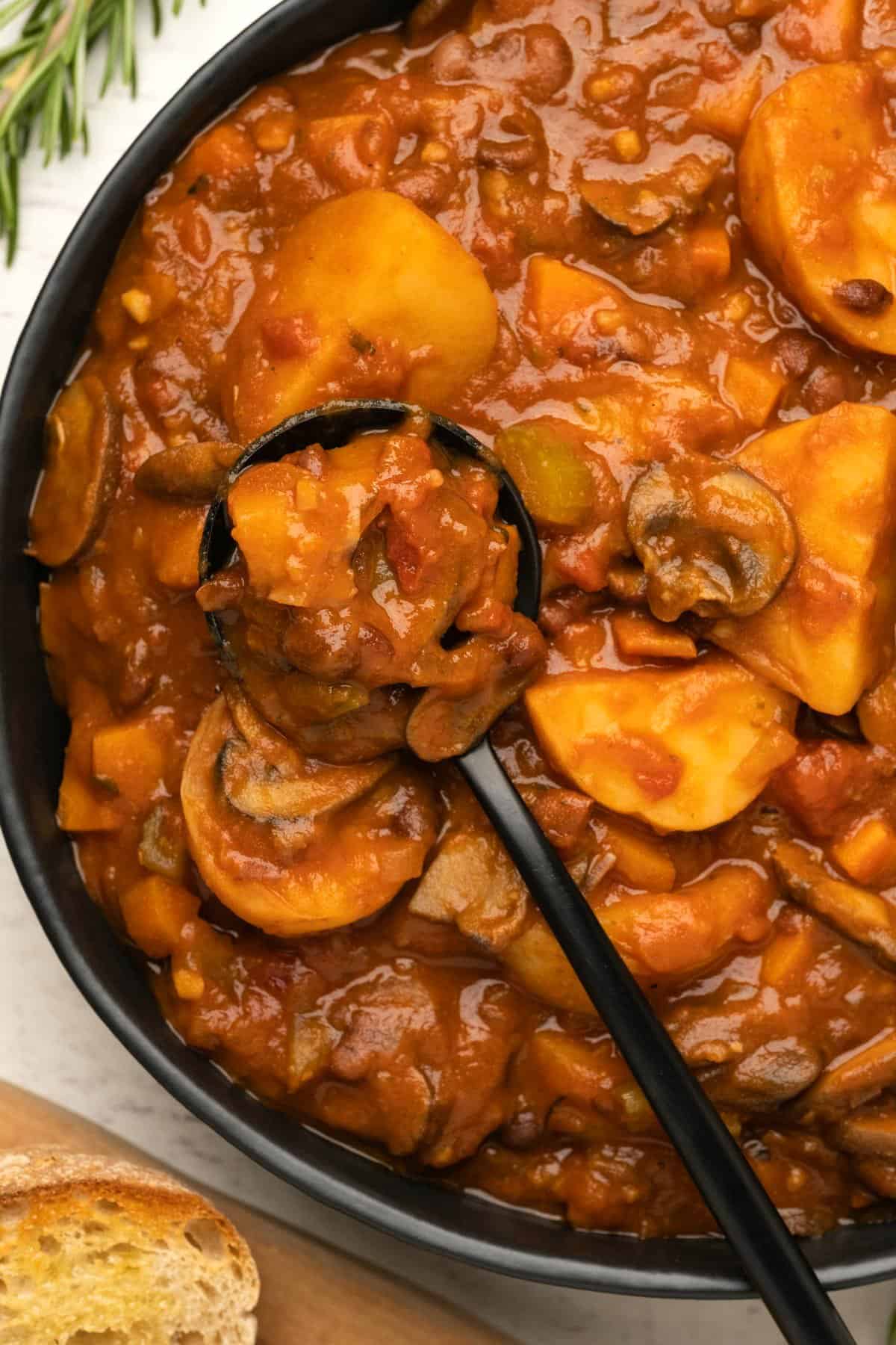 Bowl of stew with a spoon. 