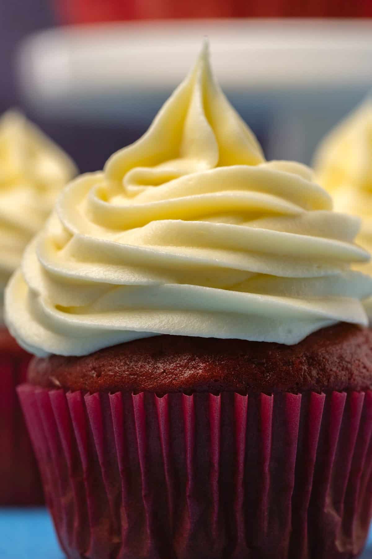 Cream cheese frosting on a cupcake. 