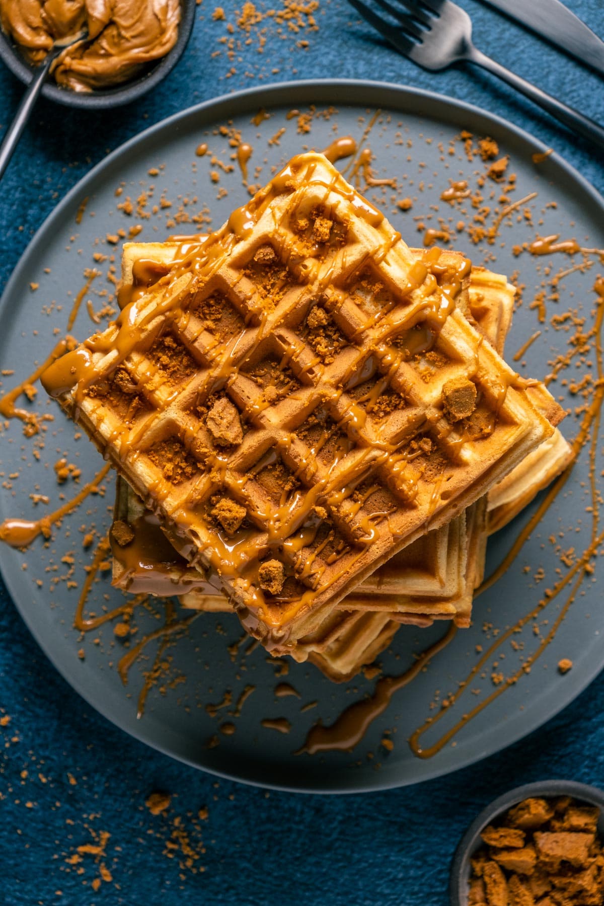 Biscoff waffles on a gray plate.