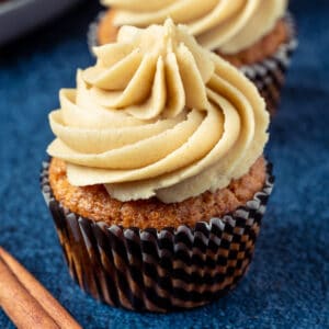 Cinnamon cupcakes frosted with cinnamon frosting.