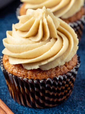 Cinnamon cupcakes frosted with cinnamon frosting.