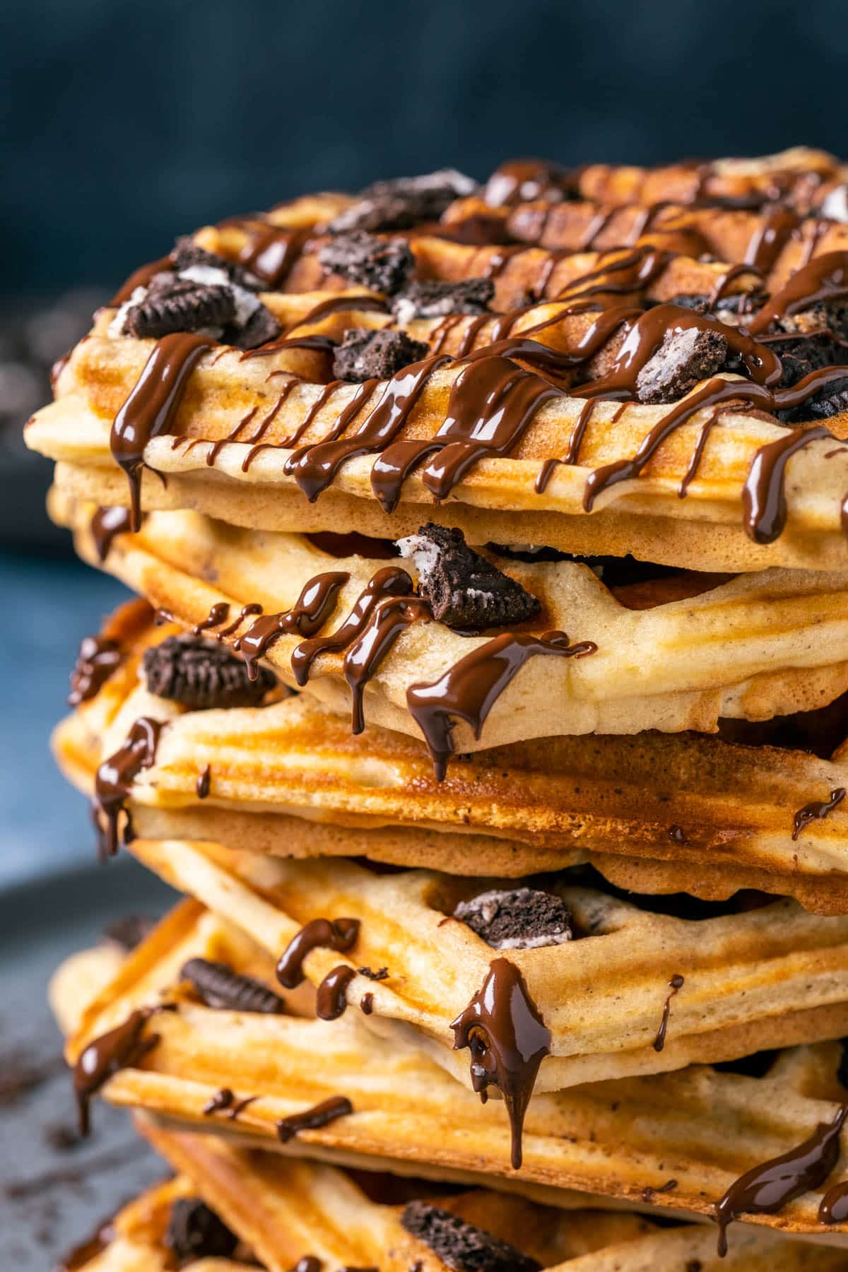 Oreo Waffles drizzled with melted chocolate.